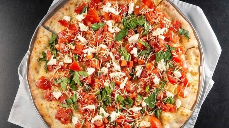 Bruschetta Pizza Slice.