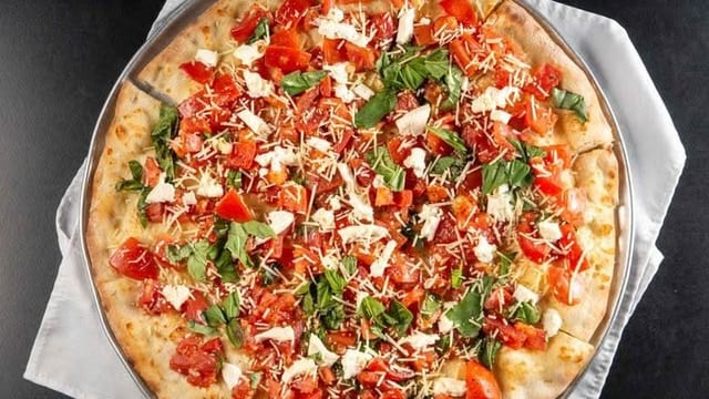 Bruschetta Pizza Slice.